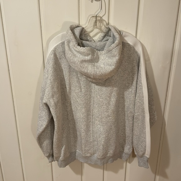 Size medium. H and M hooded draw string sweatshirt. Stripe detail on sleeves. - Picture 2 of 2